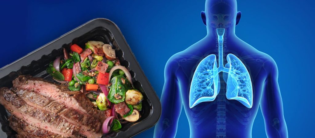 Meal in container and human graphic highlighting lungs.