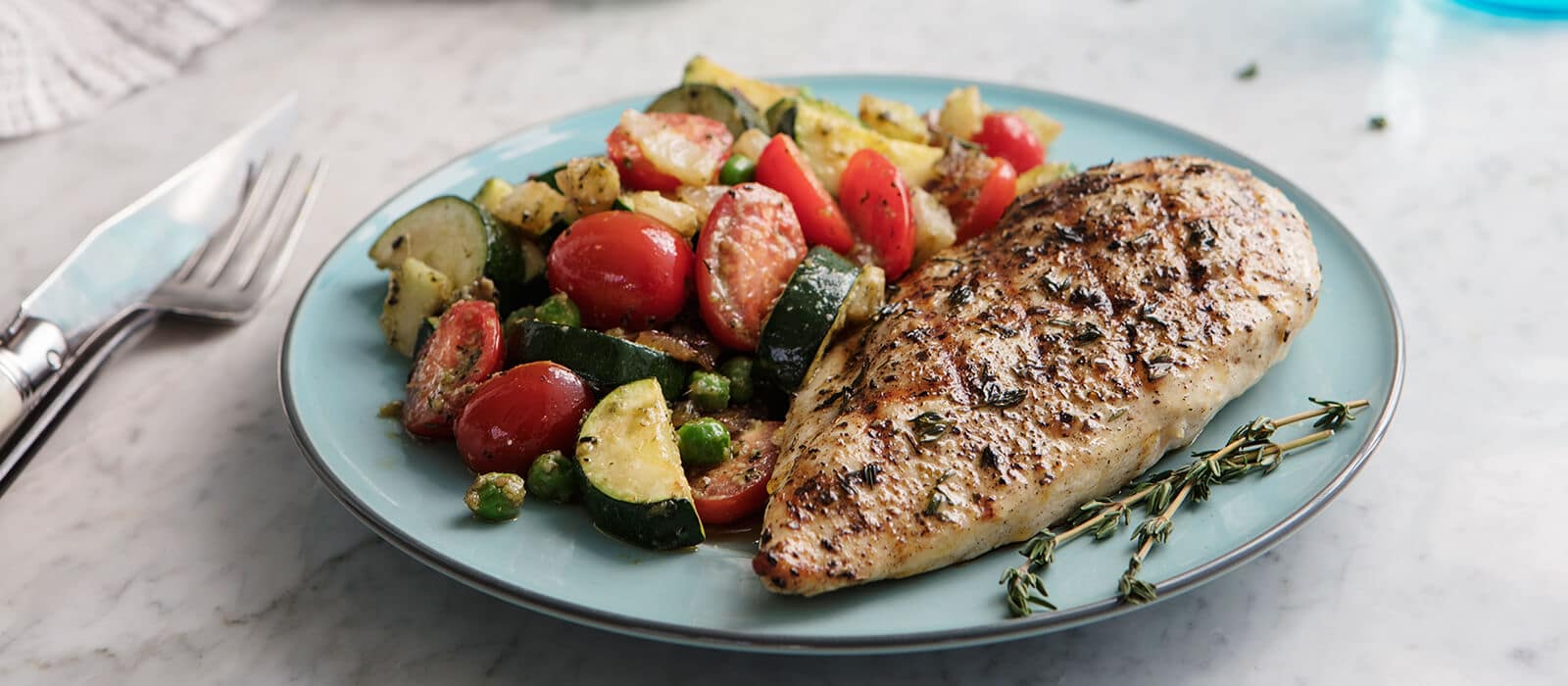 Grilled Herbed Chicken with Spring Vegetable Sauté