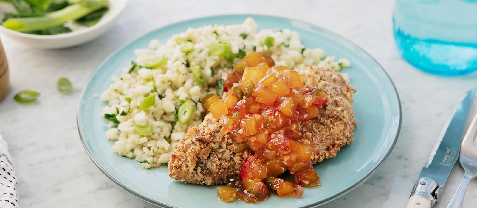 Macadamia Nut Crusted Chicken with Mango Salsa and Herbed Cauliflower Rice